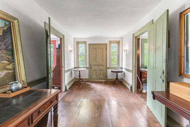 27 Tobey Hill Rd, North Canaan, CT 06018 - entryway with a baseboard radiator and hardwood / wood-style floors