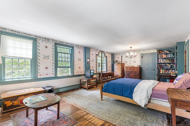 27 Tobey Hill Rd, North Canaan, CT 06018 - bedroom featuring wallpapered walls, a chandelier, and hardwood / wood-style flooring