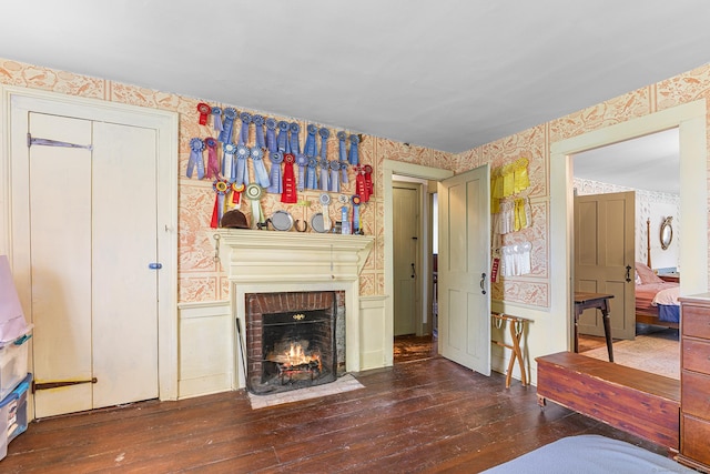 27 Tobey Hill Rd, North Canaan, CT 06018 - living area featuring wallpapered walls, hardwood / wood-style floors, and a fireplace