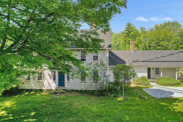 27 Tobey Hill Rd, North Canaan, CT 06018 - view of front of home with a front lawn, a chimney, and a shingled roof