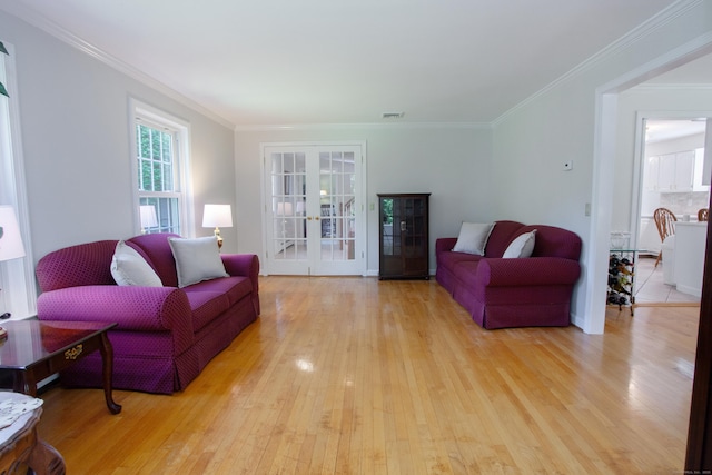 12 Northwoods Rd, Granby, CT 06060 - living area with light wood-style floors, ornamental molding, and french doors