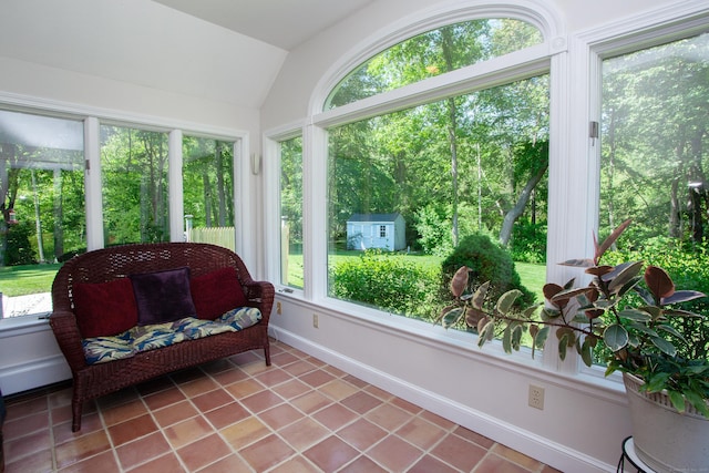 12 Northwoods Rd, Granby, CT 06060 - sunroom with lofted ceiling, healthy amount of natural light, baseboards, and tile patterned flooring