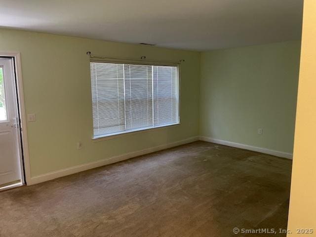 150 Forest Rd Unit 40, Milford, CT 06461 - unfurnished room with carpet floors and baseboards