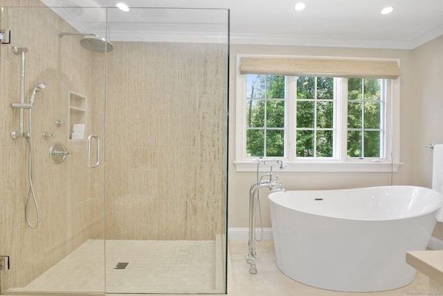 151 Woodridge Dr, New Canaan, CT 06840 - bathroom featuring a soaking tub, a stall shower, ornamental molding, baseboards, and recessed lighting