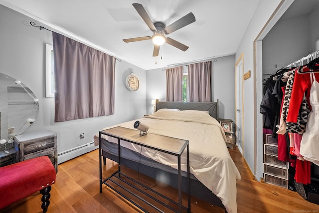 3 Celentano Dr, Naugatuck, CT 06770 - bedroom with a baseboard radiator, wood finished floors, and ceiling fan