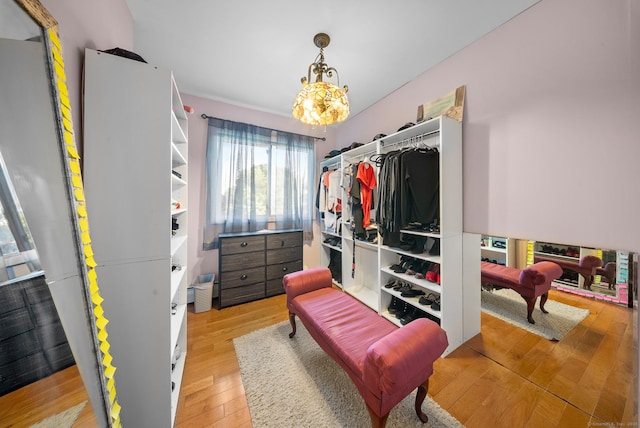 3 Celentano Dr, Naugatuck, CT 06770 - spacious closet with hardwood / wood-style flooring and a chandelier
