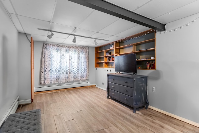 3 Celentano Dr, Naugatuck, CT 06770 - living room with baseboard heating, light wood-type flooring, and baseboards