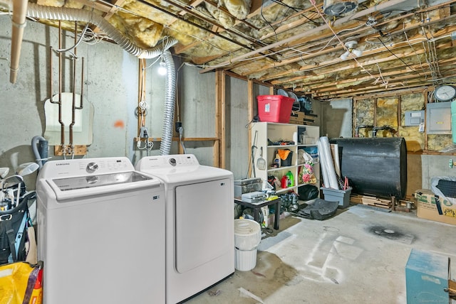3 Celentano Dr, Naugatuck, CT 06770 - laundry area featuring oil tank, washing machine and clothes dryer, and electric panel