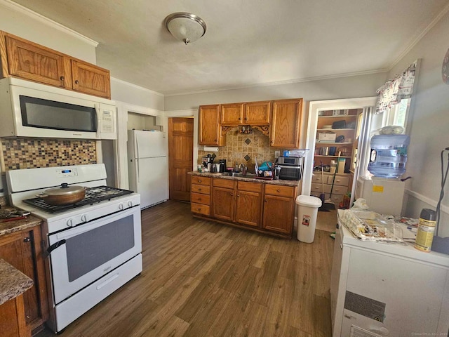 102 Mapleton St, Hartford, CT 06114 - kitchen with white appliances, brown cabinetry, backsplash, ornamental molding, and dark wood-type flooring