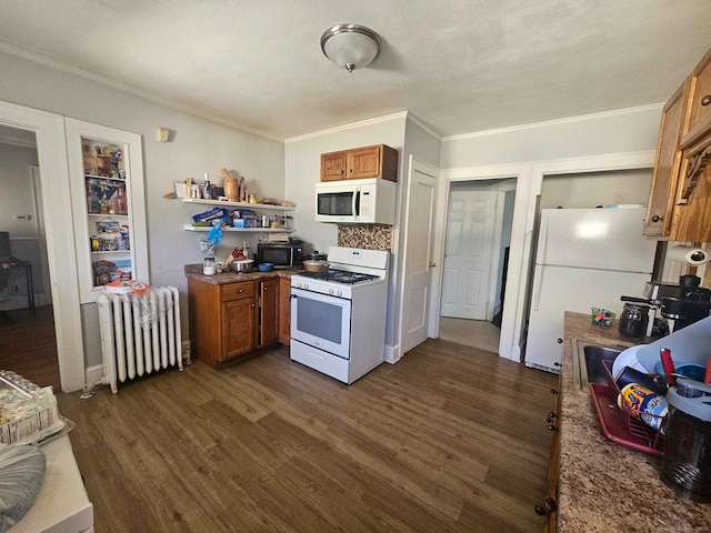 102 Mapleton St, Hartford, CT 06114 - kitchen with white appliances, radiator, brown cabinets, dark wood finished floors, and ornamental molding