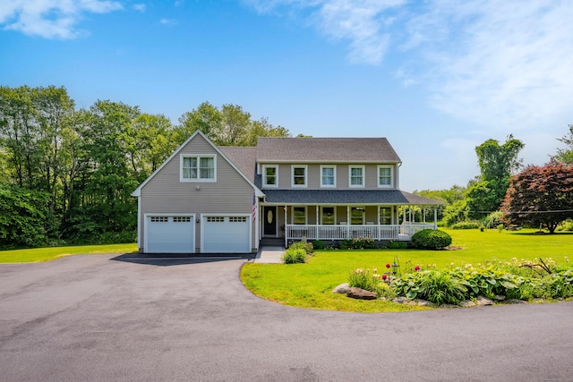 233 Church St, Hebron, CT 06231 - colonial inspired home featuring a porch, asphalt driveway, a front yard, roof with shingles, and a garage