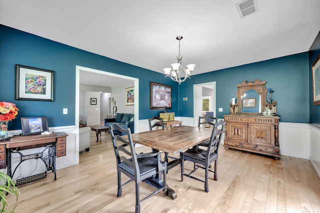 233 Church St, Hebron, CT 06231 - dining space with a chandelier and light wood finished floors