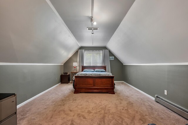 233 Church St, Hebron, CT 06231 - carpeted bedroom with a baseboard heating unit, lofted ceiling, and baseboards