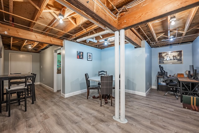 233 Church St, Hebron, CT 06231 - finished basement featuring baseboards, wood finished floors, and an office area