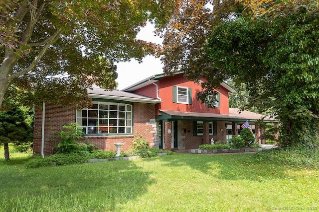 3 Glen Dr, Old Saybrook, CT 06475 - split level home featuring brick siding, a front yard, and a porch
