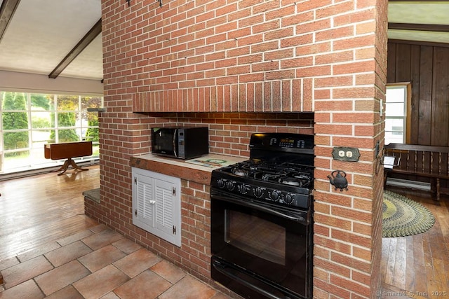 3 Glen Dr, Old Saybrook, CT 06475 - kitchen featuring black appliances, light wood finished floors, and light countertops