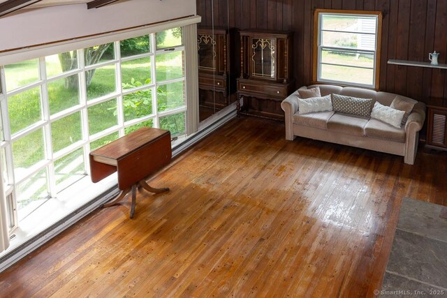 3 Glen Dr, Old Saybrook, CT 06475 - living area with hardwood / wood-style flooring and wooden walls