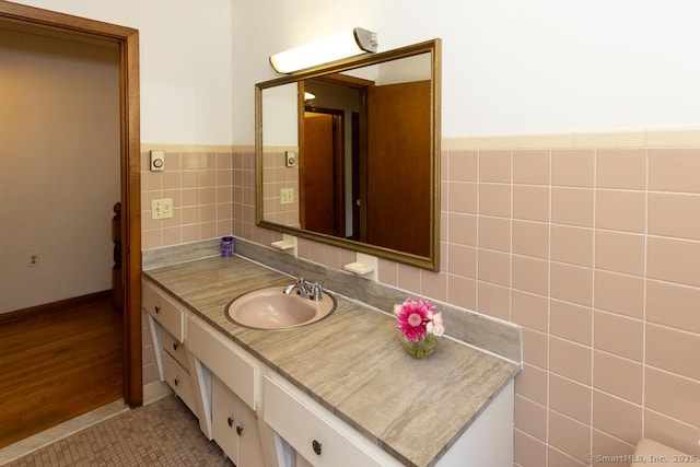 3 Glen Dr, Old Saybrook, CT 06475 - bathroom with tile walls, vanity, a wainscoted wall, and tile patterned flooring