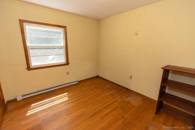 3 Glen Dr, Old Saybrook, CT 06475 - spare room with a baseboard radiator and light wood-style flooring
