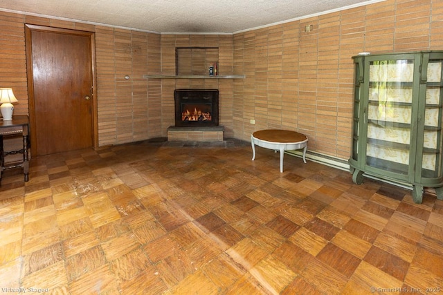 3 Glen Dr, Old Saybrook, CT 06475 - unfurnished living room featuring a fireplace and a textured ceiling