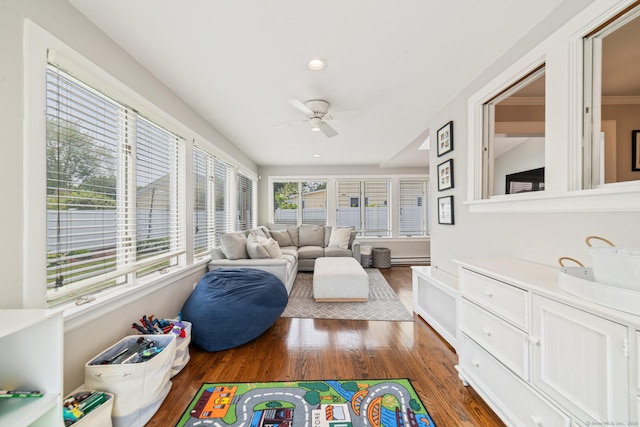 407 Meadowbrook Rd, Fairfield, CT 06824 - sunroom with wood finished floors, a baseboard radiator, and recessed lighting