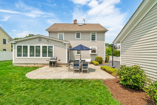 407 Meadowbrook Rd, Fairfield, CT 06824 - back of property with a chimney and a patio area
