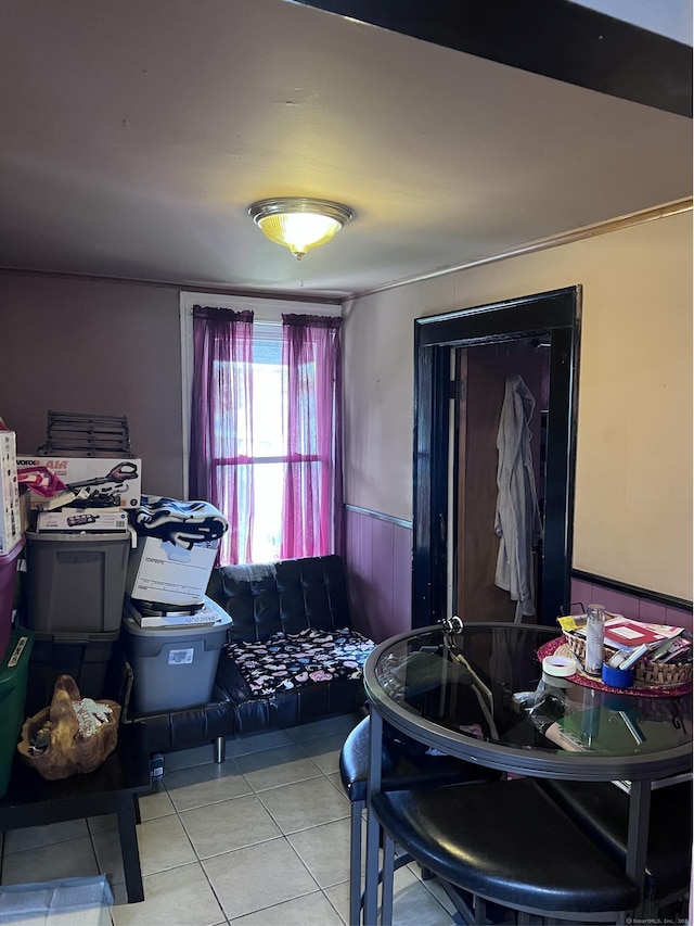 Pine St, Meriden, CT 06450 - dining space with tile patterned flooring and a wainscoted wall