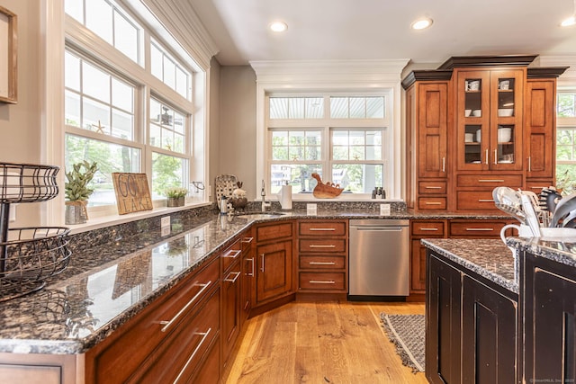112 John Hand Dr, Coventry, CT 06238 - kitchen featuring a sink, stainless steel dishwasher, light wood-style flooring, crown molding, and brown cabinets