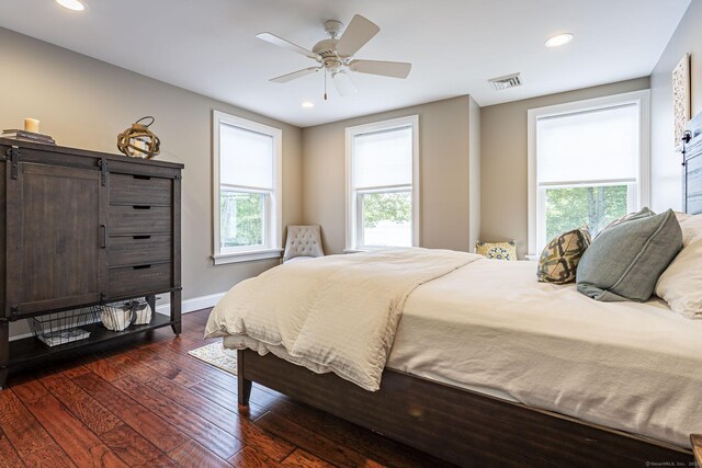 112 John Hand Dr, Coventry, CT 06238 - bedroom with multiple windows, baseboards, dark wood-style floors, recessed lighting, and a ceiling fan