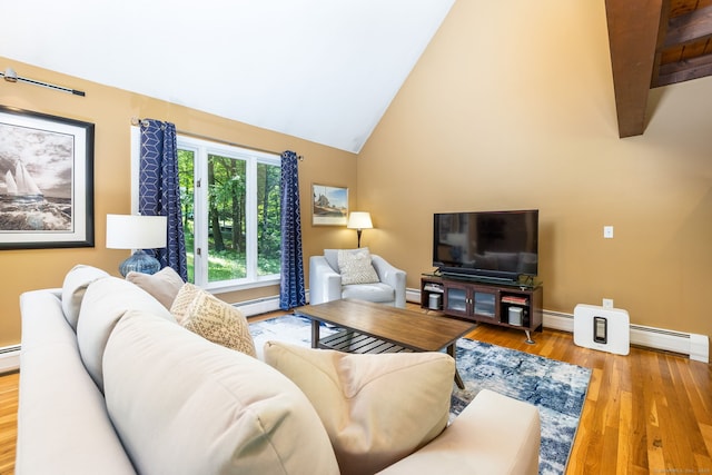 20 Roundhill Rd, Granby, CT 06035 - living area featuring a baseboard radiator, wood finished floors, baseboards, and high vaulted ceiling