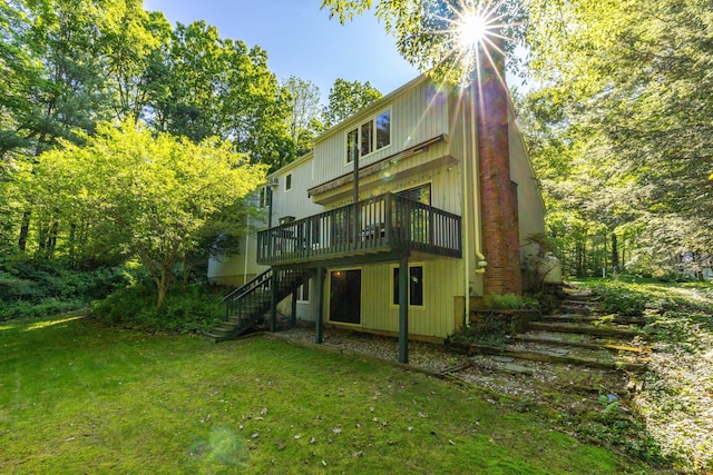 20 Roundhill Rd, Granby, CT 06035 - rear view of house featuring stairway, a lawn, and a deck