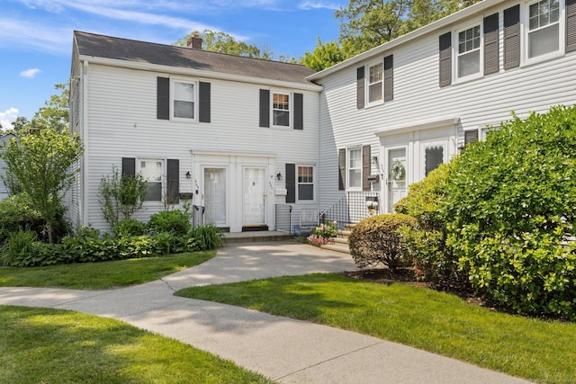 407 Sylvan Knoll Rd, Stamford, CT 06902 - view of front of property with a front yard and a chimney