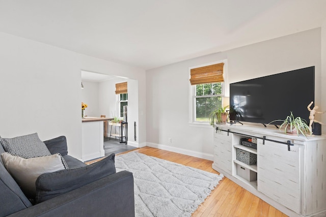 407 Sylvan Knoll Rd, Stamford, CT 06902 - living room with hardwood / wood-style floors and baseboards