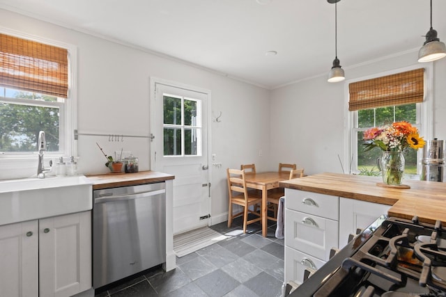 407 Sylvan Knoll Rd, Stamford, CT 06902 - kitchen featuring butcher block countertops, dishwasher, crown molding, white cabinets, and hanging light fixtures