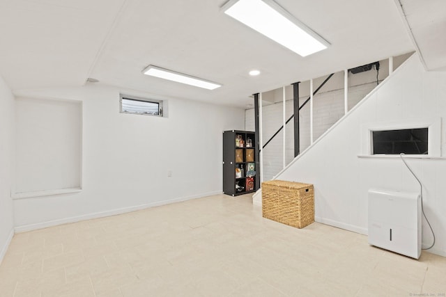 407 Sylvan Knoll Rd, Stamford, CT 06902 - basement with stairs, baseboards, and recessed lighting
