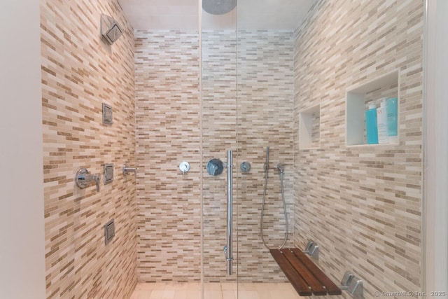 4 Berkeley Hl, Westport, CT 06880 - bathroom featuring a stall shower and tile walls