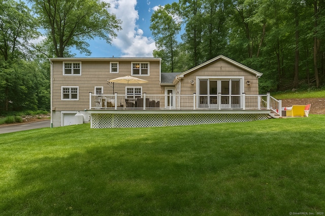 4 Berkeley Hl, Westport, CT 06880 - rear view of property featuring a deck and a lawn