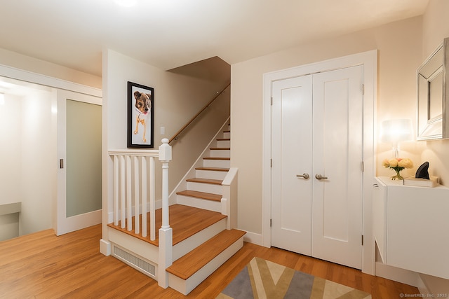 4 Berkeley Hl, Westport, CT 06880 - stairway featuring wood finished floors