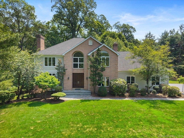 1 Mountaincrest Dr, Cheshire, CT 06410 - view of front of house with a chimney and a front lawn
