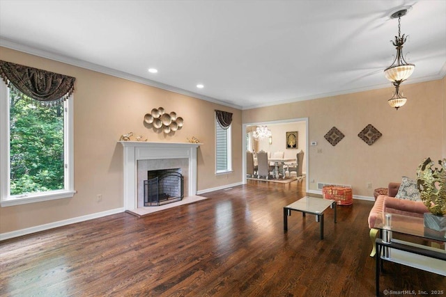 1 Mountaincrest Dr, Cheshire, CT 06410 - living room with plenty of natural light, crown molding, baseboards, wood finished floors, and a fireplace