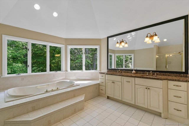 1 Mountaincrest Dr, Cheshire, CT 06410 - bathroom featuring vanity, a garden tub, plenty of natural light, lofted ceiling, and a shower stall