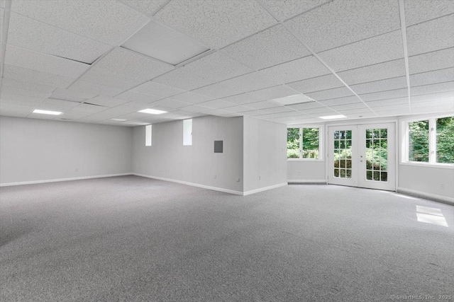 1 Mountaincrest Dr, Cheshire, CT 06410 - carpeted empty room featuring baseboards, a drop ceiling, and healthy amount of natural light