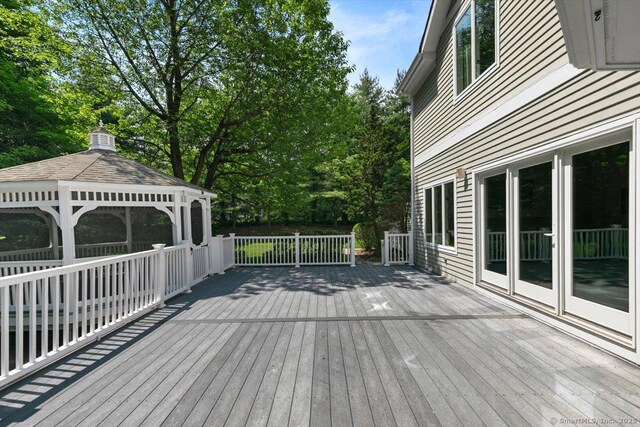 1 Mountaincrest Dr, Cheshire, CT 06410 - deck with a gazebo and view of wooded area