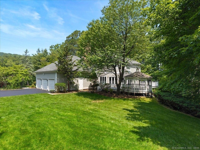 1 Mountaincrest Dr, Cheshire, CT 06410 - view of front of house featuring a gazebo, asphalt driveway, a front lawn, and a garage