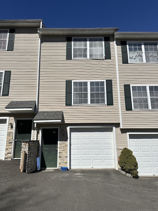 135 Bucks Hill Rd Apt 10, Waterbury, CT 06704 - view of property with an attached garage and driveway