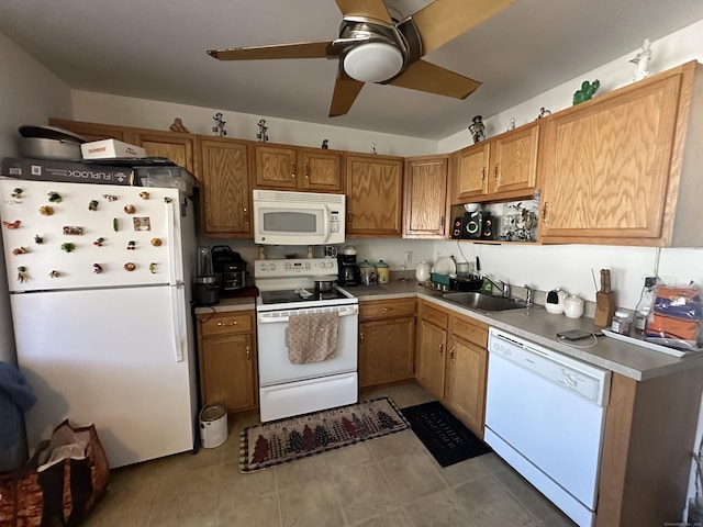 135 Bucks Hill Rd Apt 10, Waterbury, CT 06704 - kitchen with white appliances, a sink, ceiling fan, brown cabinets, and light countertops
