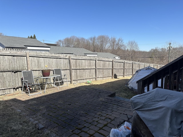 135 Bucks Hill Rd Apt 10, Waterbury, CT 06704 - fenced backyard with a patio area and a grill