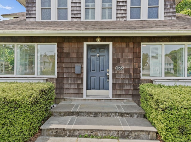 355 Main St, Old Saybrook, CT 06475 - property entrance featuring a shingled roof