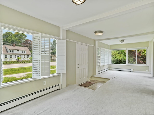 355 Main St, Old Saybrook, CT 06475 - carpeted foyer featuring a baseboard heating unit and healthy amount of natural light