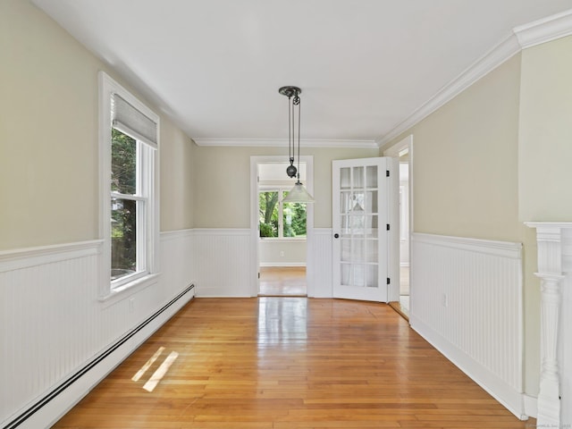 355 Main St, Old Saybrook, CT 06475 - unfurnished dining area with a baseboard radiator, wainscoting, light wood-type flooring, and ornamental molding